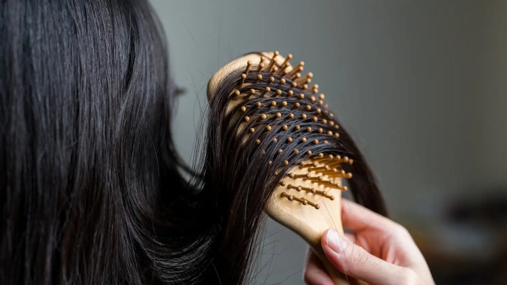 Woman brushing her hair