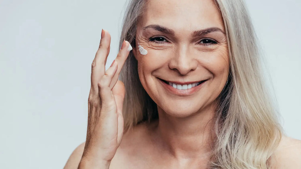 Senior woman doing her skincare
