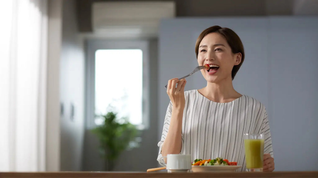 Woman eating healthy salad