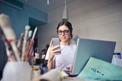 Woman staring at her cell phone