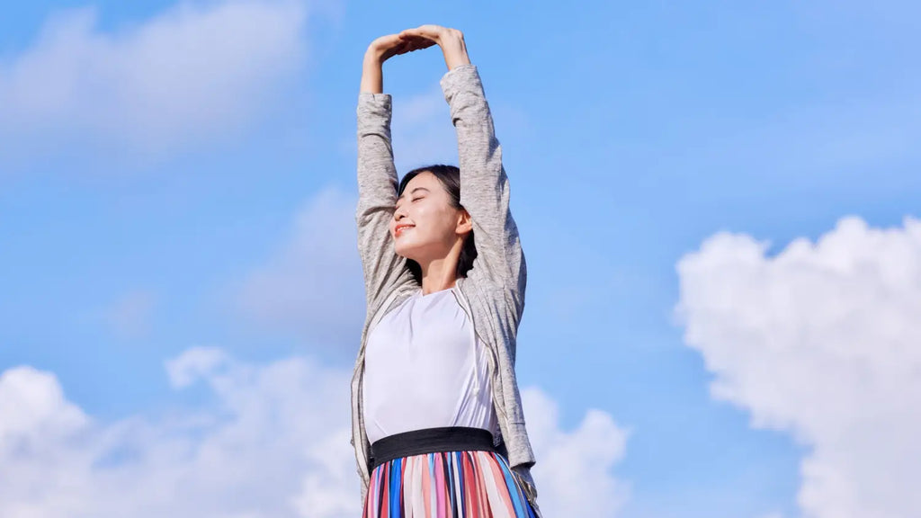 Woman stretching outdoors