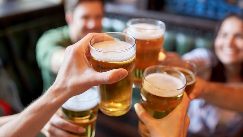 Friends cheering with beer