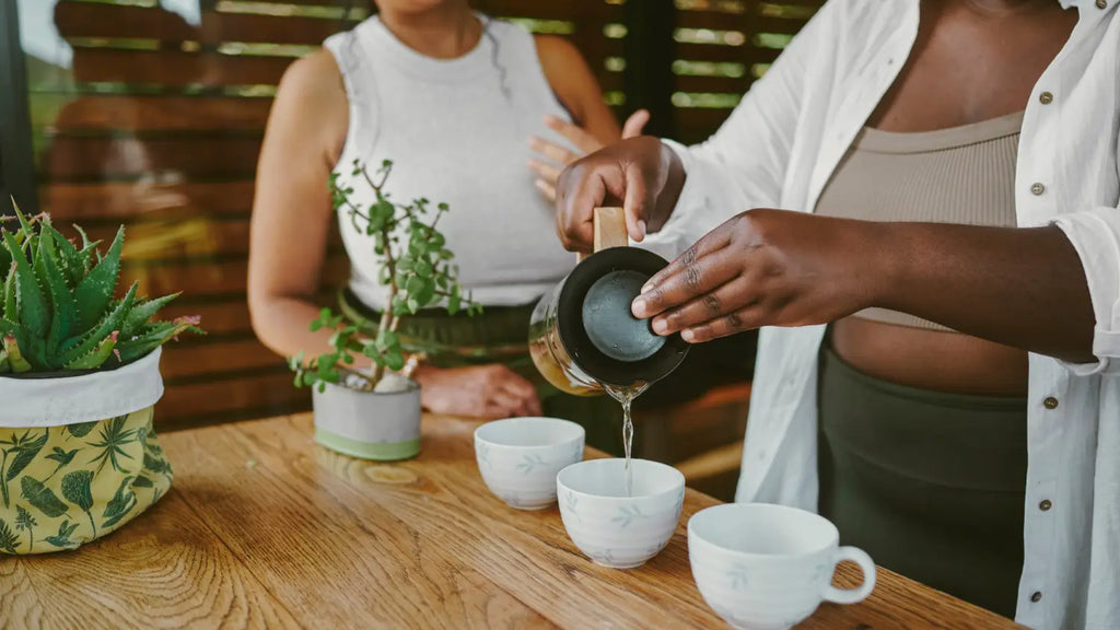 Pouring tea into cups