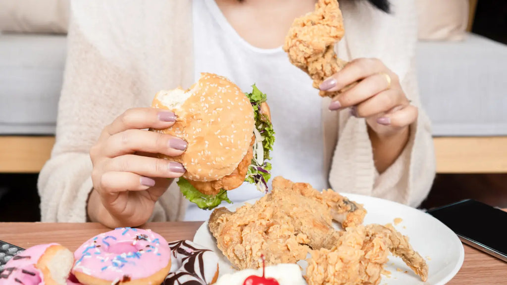 Woman eating fast food
