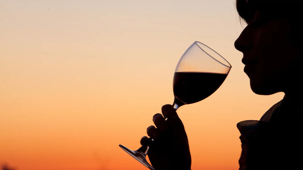 Woman drinking glass of wine