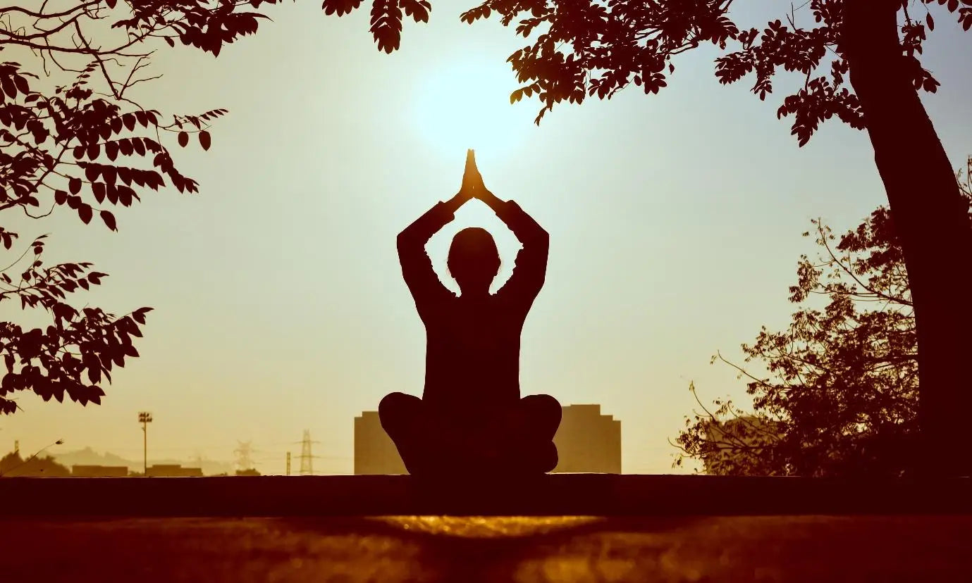 Person meditating.