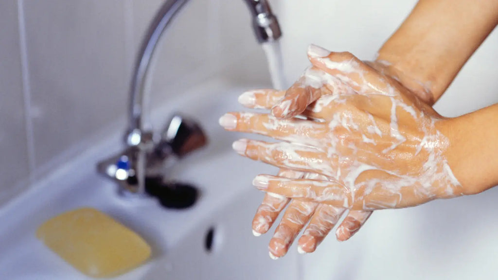 Woman washing her hands