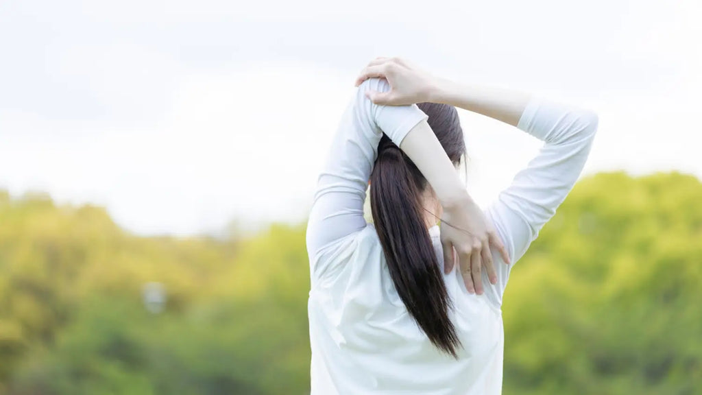 Woman stretching outdoors