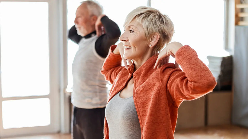 Senior couple doing body weight workout