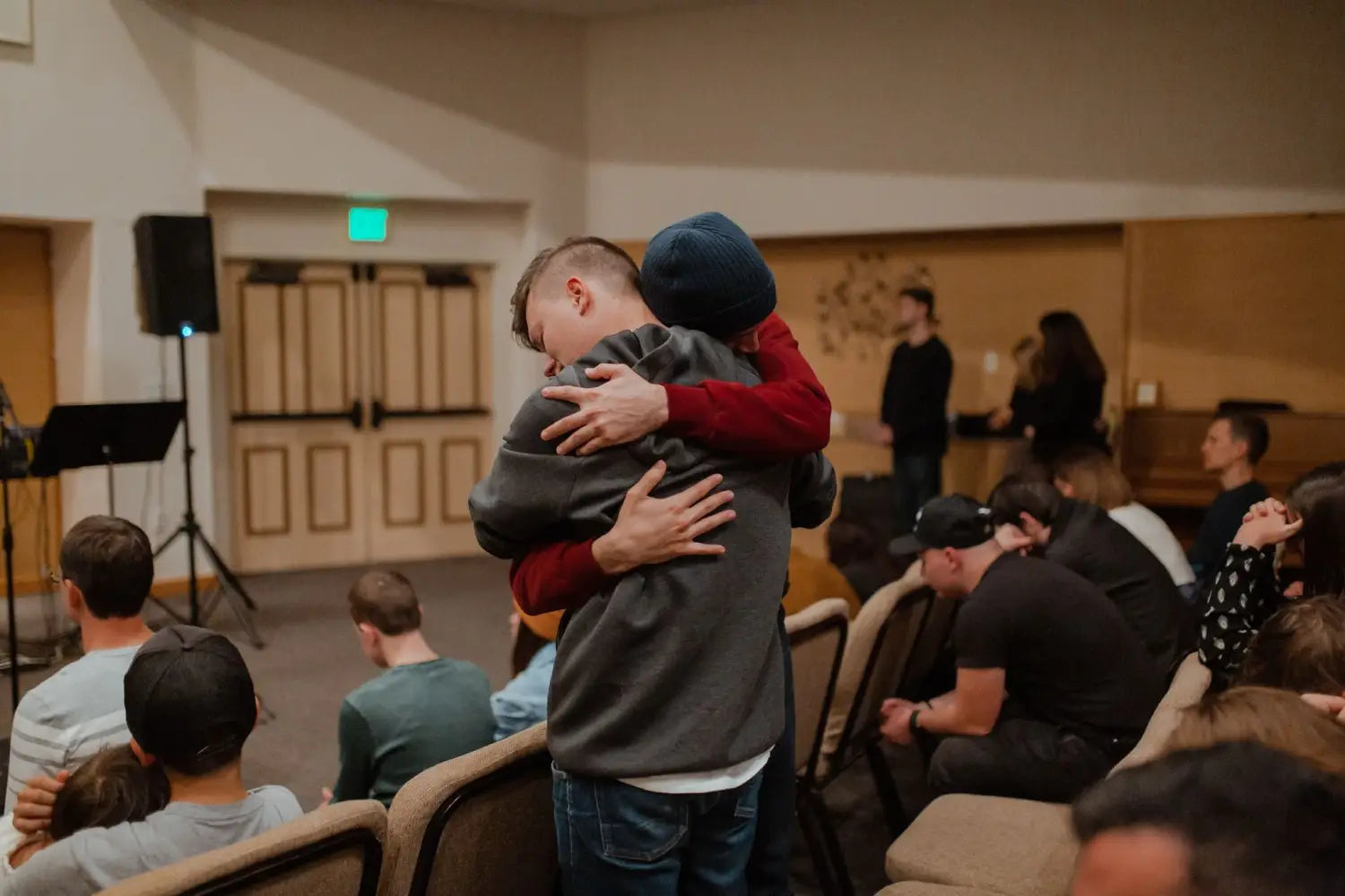 Friends hugging each other.