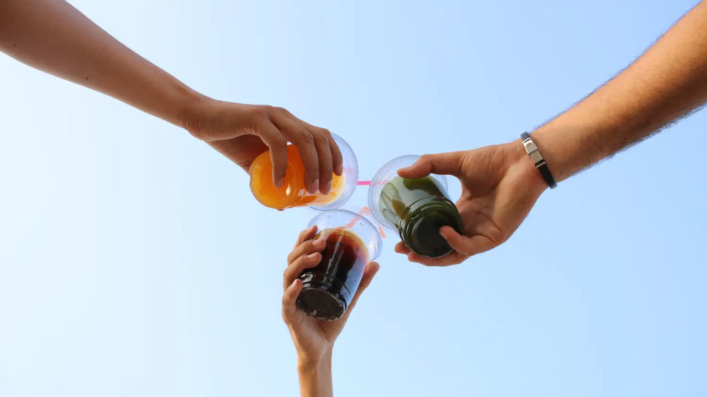 friends cheering with juice