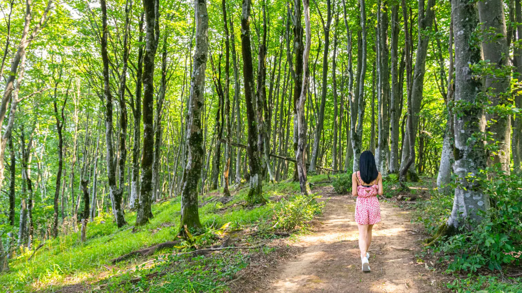 Woman walking in the forest