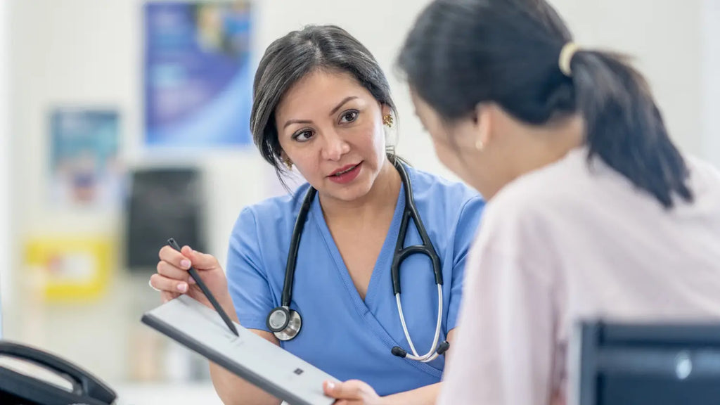 Woman talking with health professional