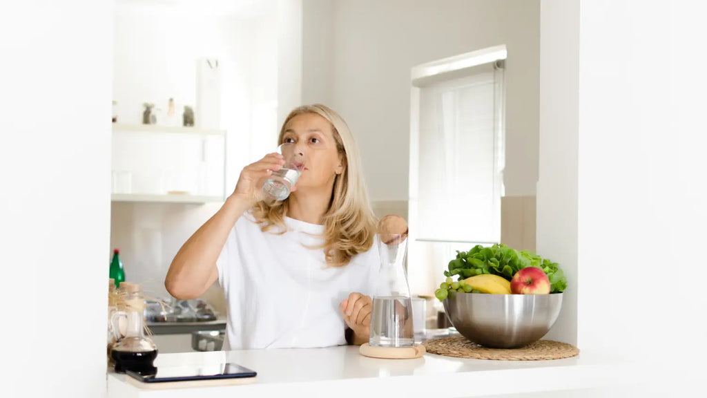 Woman drinking glass of water