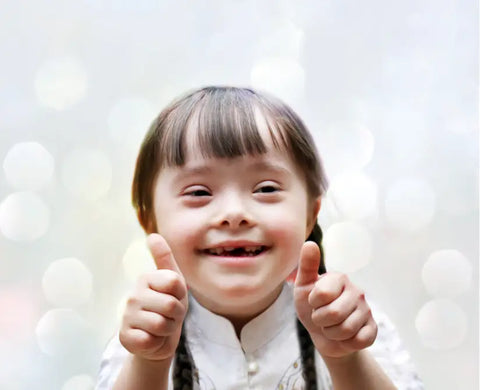 Little girl with down syndrome.