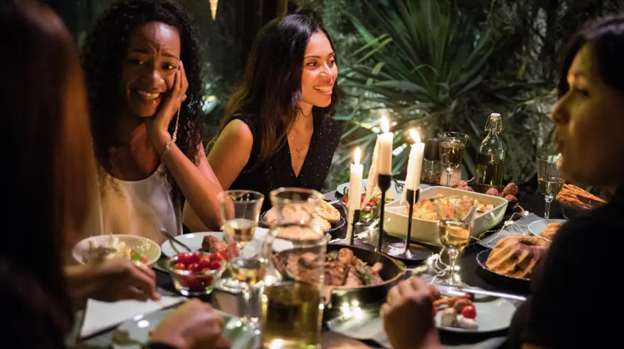 Group of friends in holiday dinner