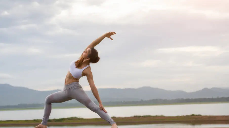 Woman practicing yoga outside