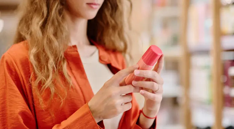 Woman reading product label