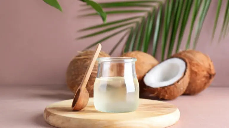 Coconuts and jar of coconut oil