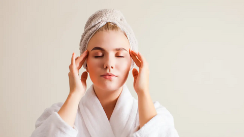 Woman self massaging her face