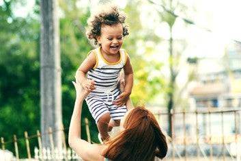 Mother playing with her kid