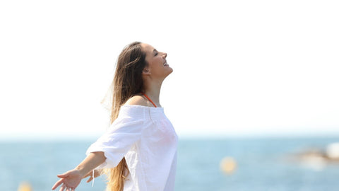 Woman smiling with her arms open