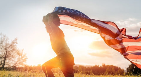 Kid holding US flag