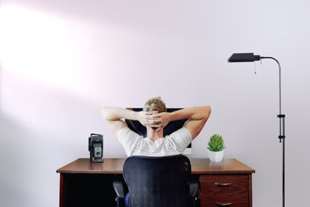 Man sitting in office chair