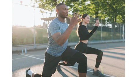 Couple exercising outdoors.