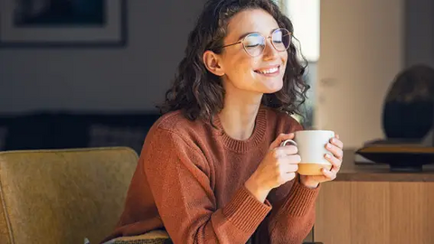 Woman drinking hot tea