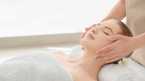 Woman getting a facial massage