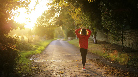 Woman taking a walk in a park