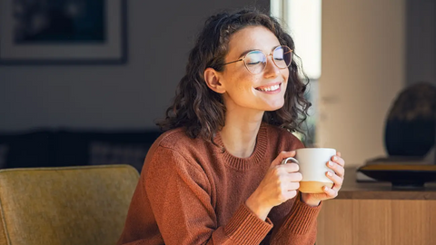 Woman drinking hot tea