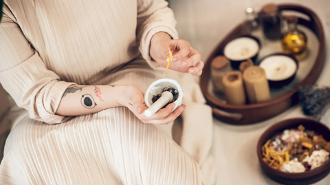 Ayurvedic therapist preparing medicine