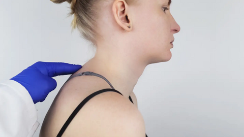 Side profile of woman with neck hump