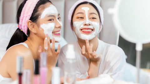 Two friends with facial mask