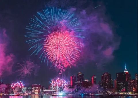 Fireworks over city buildings