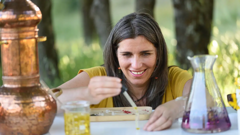 Naturopath holding essential oil