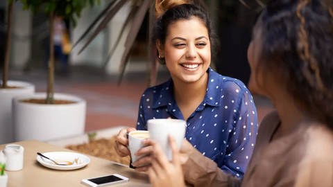 Friends having coffee together