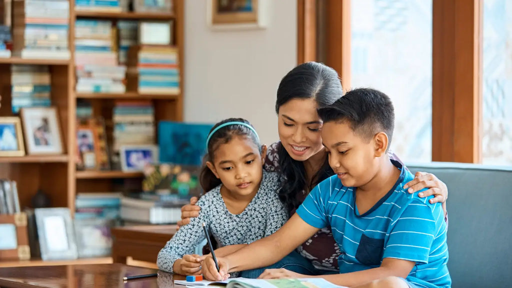 Mom helping children with homework