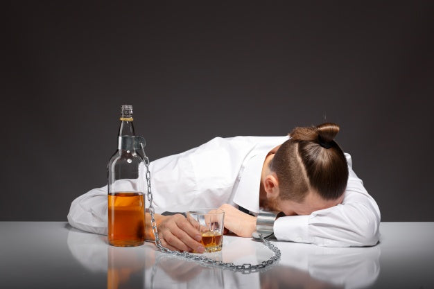 Man handcuffed to bottle of alcohol