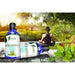 A lifestyle image of a woman relaxing in nature with product shot for Double Pack Instant Calm Formula Stress Free Therapy